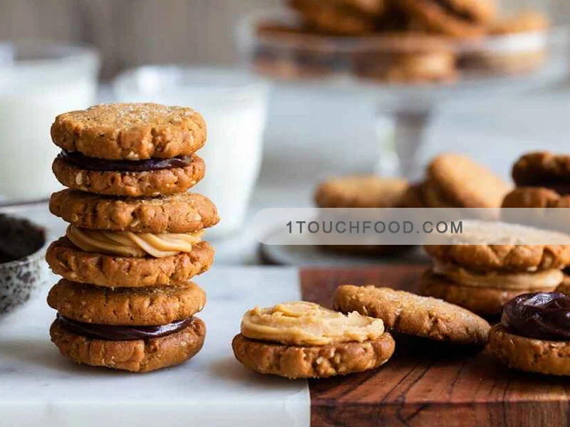 طرز تهیه کوکی کره بادام زمینی و جو دوسر زنجبیلی 12 عددی 1 طرز تهیه کوکی کره بادام زمینی و جو دوسر زنجبیلی مجلسی