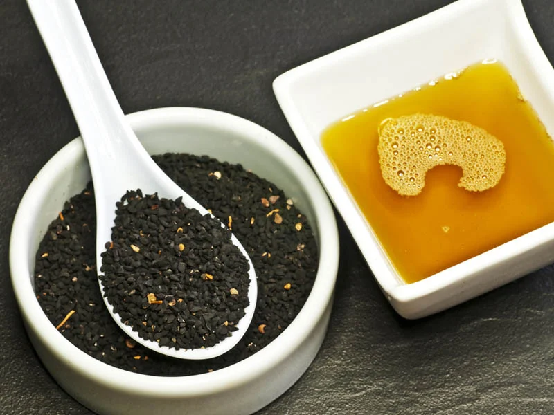 Steps in making black seed and honey potion